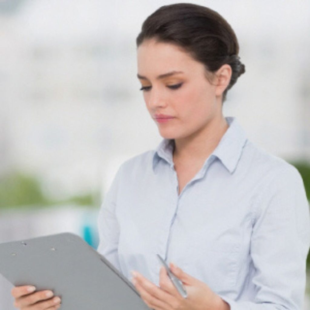 Lady looking at clipboard