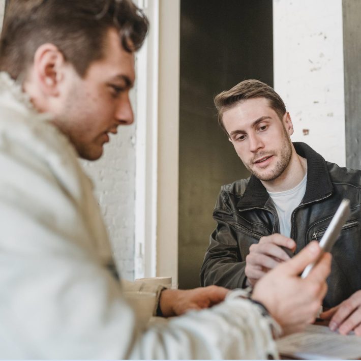 Two men in mid conversation